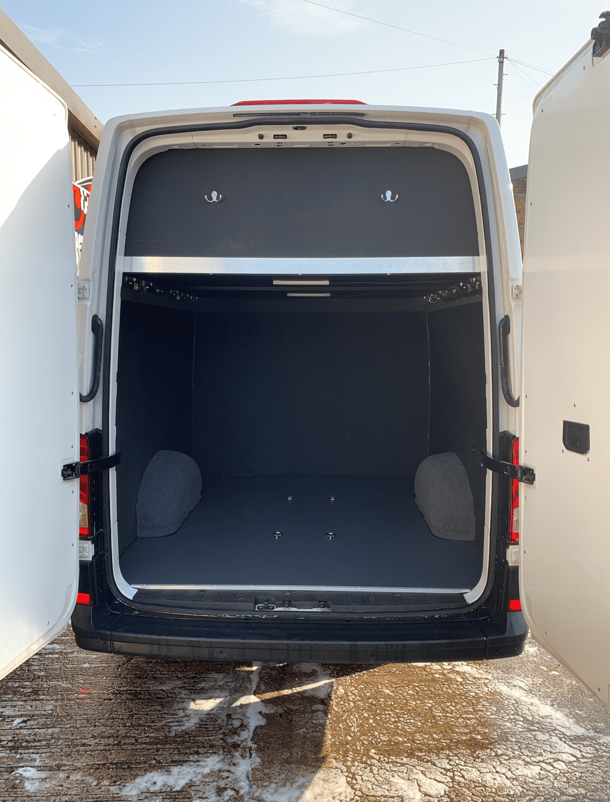White VW Crafter Campervan Conversion with garage, toilet and shower